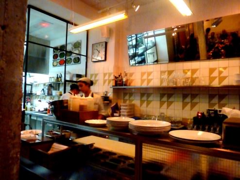 The cold kitchen outside in the dinning room, the decor is industrial style but not overwealming 