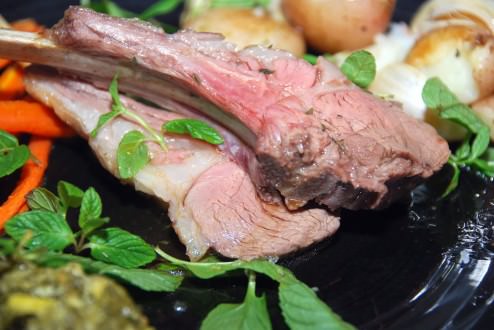 Lamb ribs, mint and chili chimichurri, baked Potatoes, garlic and honey roasted carrots