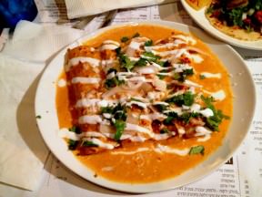Enchiladas Rojas: four rolled corn tortillas filled with meat, hot chipotle red salsa, shredded cheese, sour cream, onion and cilantro (46 NIS)