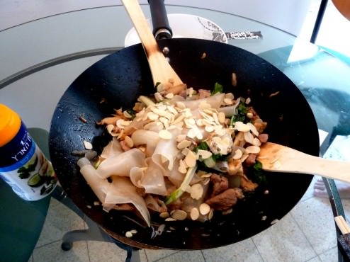 Stir-fry pork with Chinese greens, oyster mushrooms and almonds