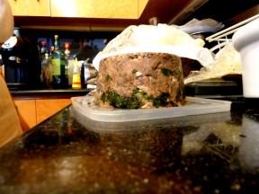 The meat is then pulled from the bones and pressed in a terrine with two layers of mint leaves