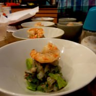 Shrimp tartar and on top one pan fried shrimp