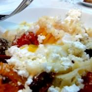 The yolk oozing over the dish