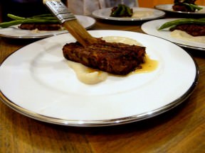 A piece of the lamb terrine painted in lamb jus