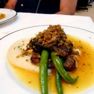 Terrine of lamb with mint, fine vegetables: green beans, champignon and shimeji mushrooms, cream of Jerusalem artichoke, lamb jus and crispy breadcrumbs.