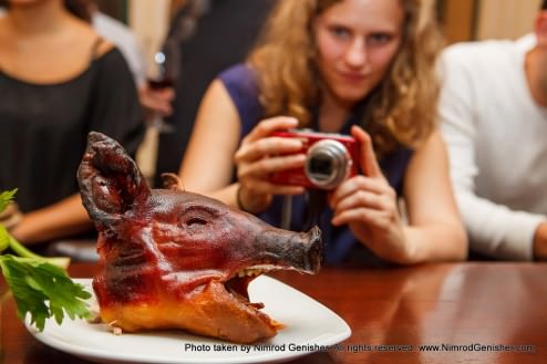 Whole piglet marinated in Calvados, honey and apples.