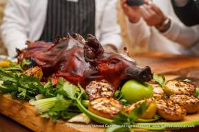 Whole piglet marinated in Calvados, honey and apples.