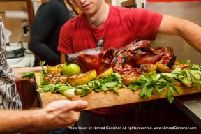 Whole piglet marinated in Calvados, honey and apples.