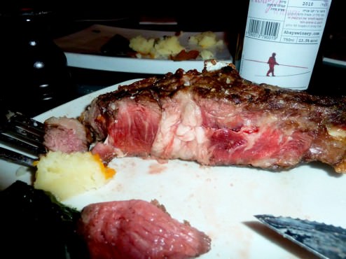 Prime Rib, aged and juicy Entrecote on the bone from a senior cow.