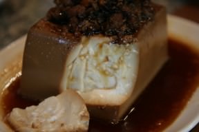 Very soft delicate tofu braised in soy with meat on top.