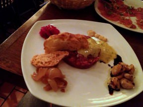 Steak Tartare from beef fillet, tartare sauce, mustard, garlic confit, caramelized onions and red cabbage (58 NIS).