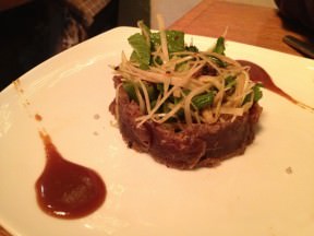 Tataki beef fillet marinated in white miso, with green beans and papaya salad (59 NIS).