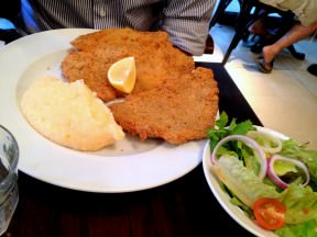 Veal Schnitzel with mashed potatoes and green salad (72 NIS).