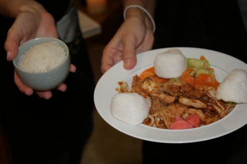 The Korean dish: Pork and calamari, hot pepper sauce, zucchini and carrot slices, tarragon, pickled radish, coconut sticky rice, shrimp rice puffs
