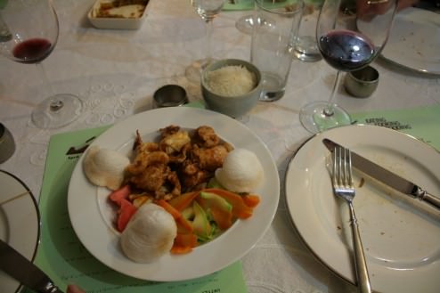 The Korean dish: Pork and calamari, hot pepper sauce, zucchini and carrot slices, tarragon, pickled radish, coconut sticky rice, shrimp rice puffs