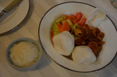 The Korean dish: Pork and calamari, hot pepper sauce, zucchini and carrot slices, tarragon, pickled radish, coconut sticky rice, shrimp rice puffs