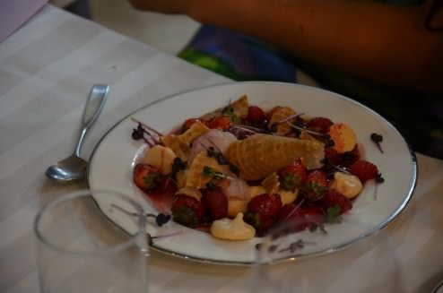 The French dessert: Crème Patissier, meringue, apple in butter and thyme, lychee and berries Sorbet, berries in syrup, whipped yogurt and waffle cone pieces