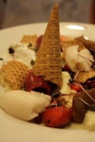 The French dessert: Crème Patissier, meringue, apple in butter and thyme, lychee and berries Sorbet, berries in syrup, whipped yogurt and waffle cone pieces