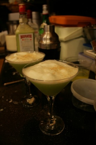 Apple Martini: Gin, dry Vermouth, Amaretto, fresh apple juice, lemon juice, egg white and nutmeg.